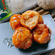 Grilled chicken balls on skewers