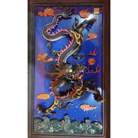 A Set of High Relief Nine-Dragon Wall Porcelain Panels