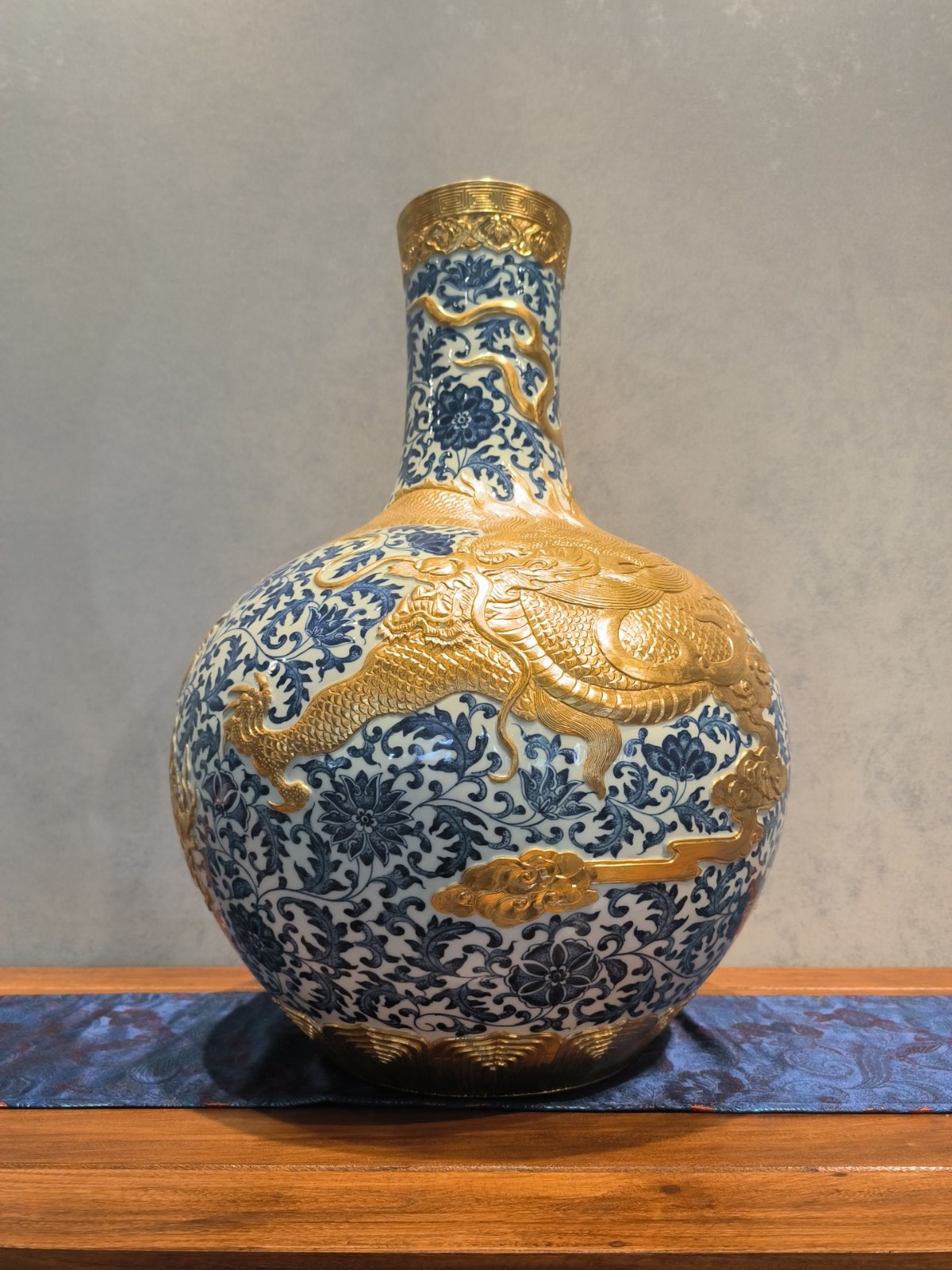 Blue and White Dragon and Lotus Carved Celestial Globe Vase