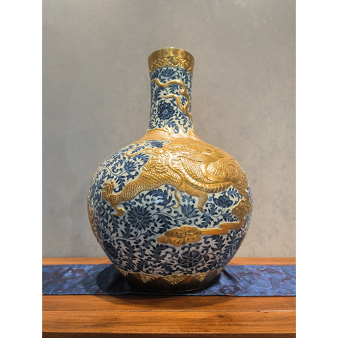 Blue and White Dragon and Lotus Carved Celestial Globe Vase