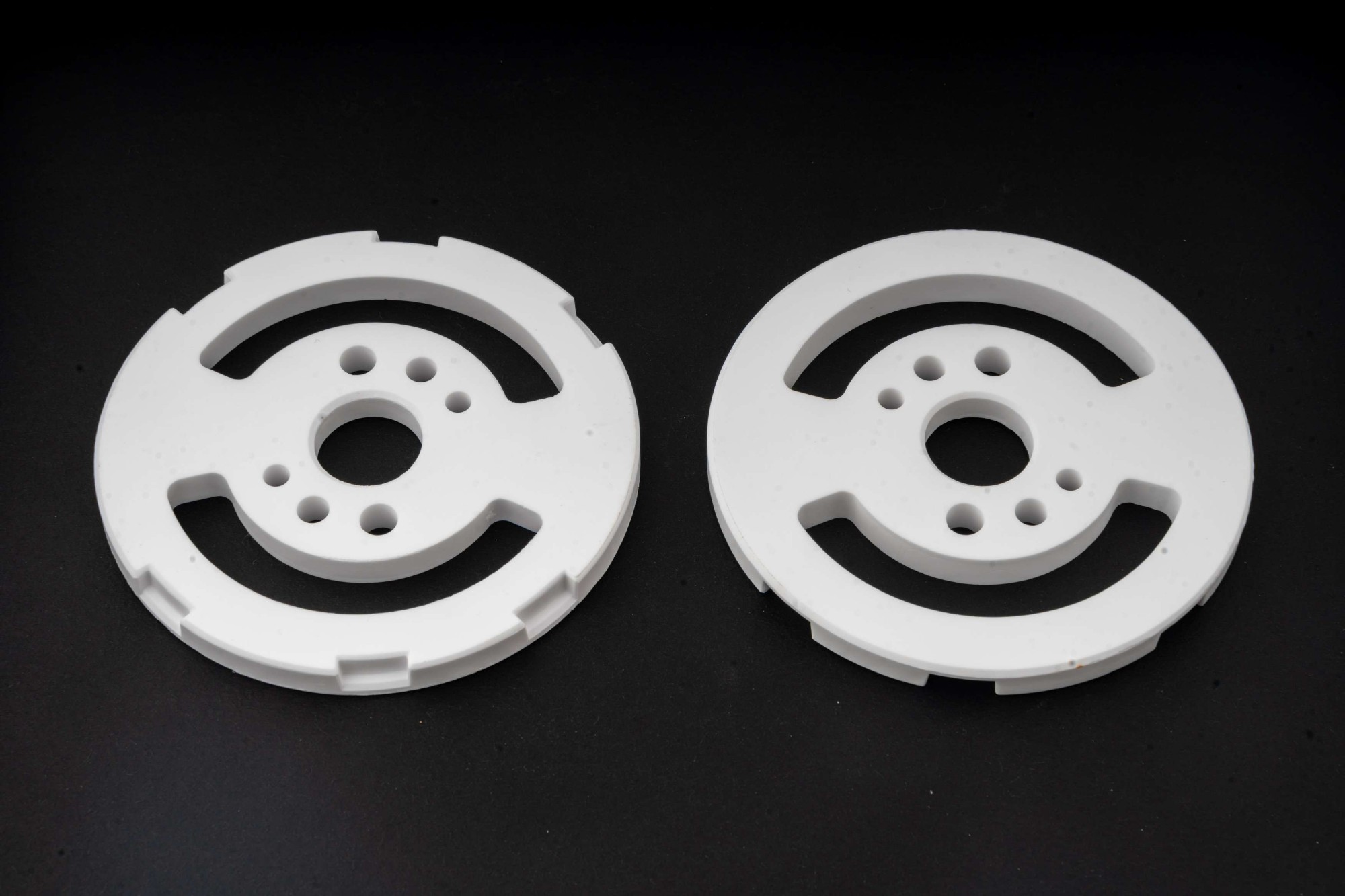 Sanitary ceramic valve plate